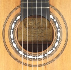 A Roudhloff x-braced Melophonic guitar of c. 1842 by Roudhloff, arguably the finest  achievement of  nineteenth-century guitar making in London.